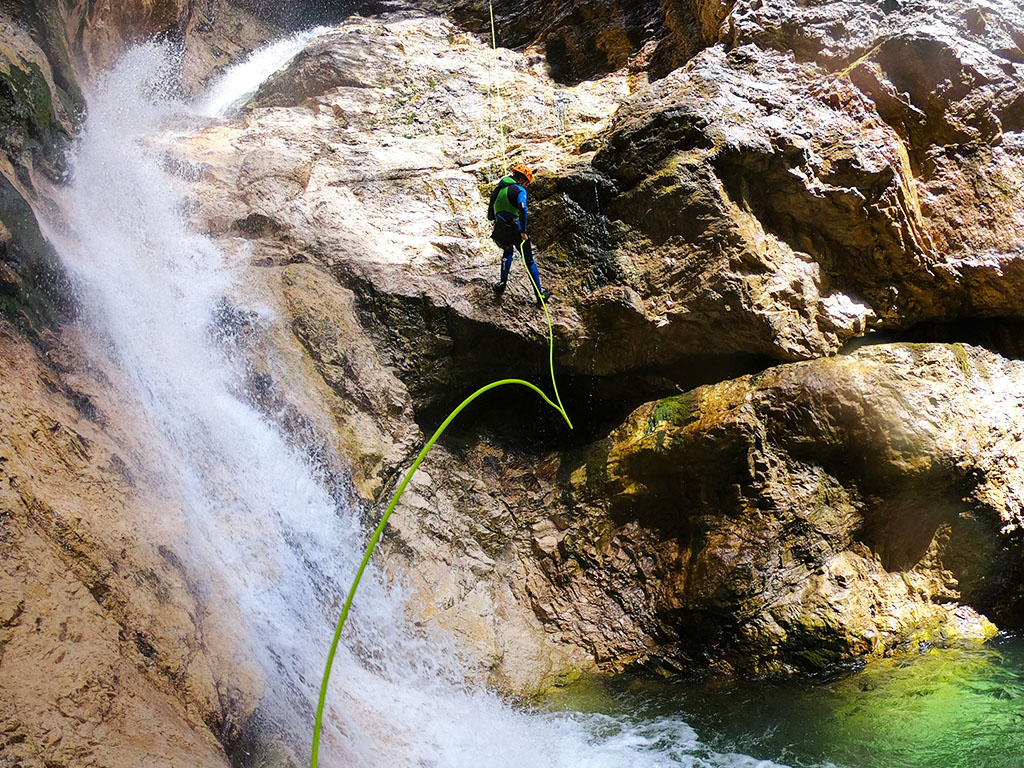 One of many rappels in Rio Simon canyon in Italy.