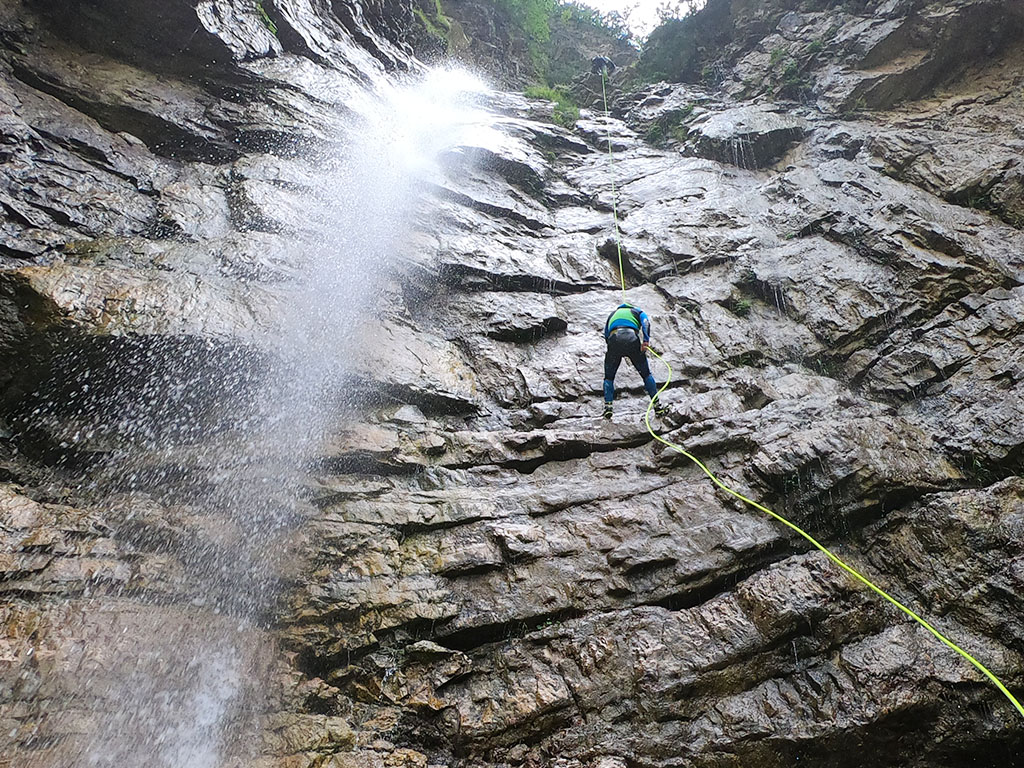 Rappeling last watergall in upper Predelica canyon.